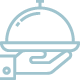 Icône graphique bleu lagon représentant une cloche de service de restaurant de la Table de Trois à Bordeaux pour la section prestations.